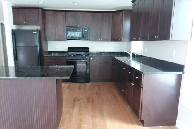 x - Rare 4 Bed / 4 Bath | 1,700 SF | Garage Parking | Central Air | 9/1 Apartments