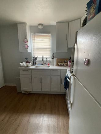 Kitchen (side door in kitchen with access to laundry area) - Roomate Needed - Quiet and safe neighborhood, on the water, North Quincy Apartments