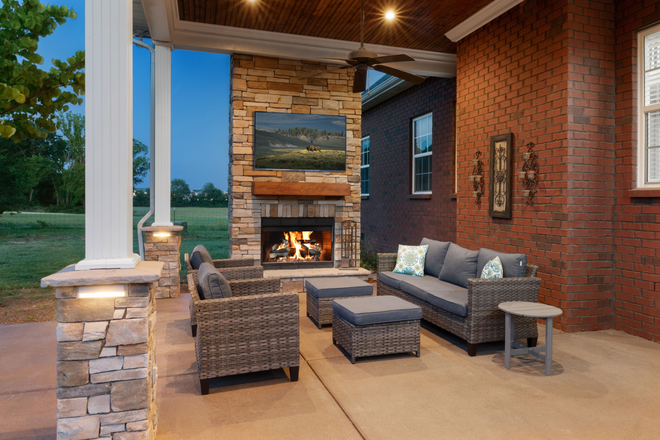 A patio to relax on and watch the game. Grill, blackstone and fireplace to use. - Home away from Home