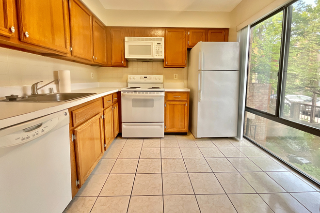 Kitchen with Eat-In area in front of picture window - Rental at Park Place - Gated Community Townhome