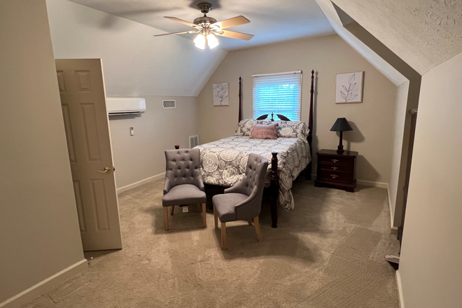 Bedroom above garage with attached bathroom - Comfy Room with Private Bath and Pool Access on Golf Course in Madison House