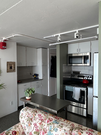 open kitchen and living space - Sunny One-Bedroom with Great Views in High-Rise Building on 14th floor Apartments