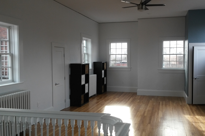 huge living area with closet - Unique PH loft in brick, elevator bldg near Harvard Sq. Upgraded. 2 full baths! Huge deck!