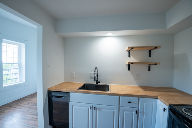 Kitchen - Modern Studio Steps from UC – Available Now! Apartments