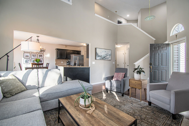 Living room with amazing natural light and open concept - Updated 3BR Near Creighton | 10 Min to Campus House