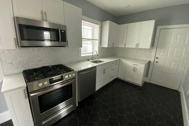 . - Renovated 4 Bed/1 Bath - IN UNIT LAUNDRY and PARKING - avail NOW!!!