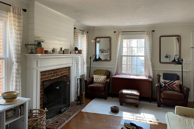 The living room fireplace is so nice to cozy up to during the colder months, - Quiet 2 Bed 1.5 Bath House In Walkable Neighborhood