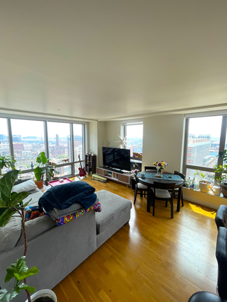 Living Room - Bedroom+private bath available in Beautiful 2 bed/2 bath Downtown Apartments