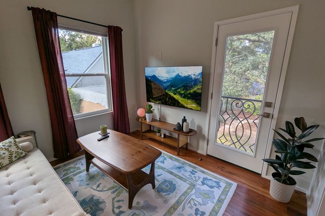 living area, 55" LG TV, Juliette balcony - New studio apartment in Avondale, 2.2 mi. from MUSC & 10 mi. from Folly Beach