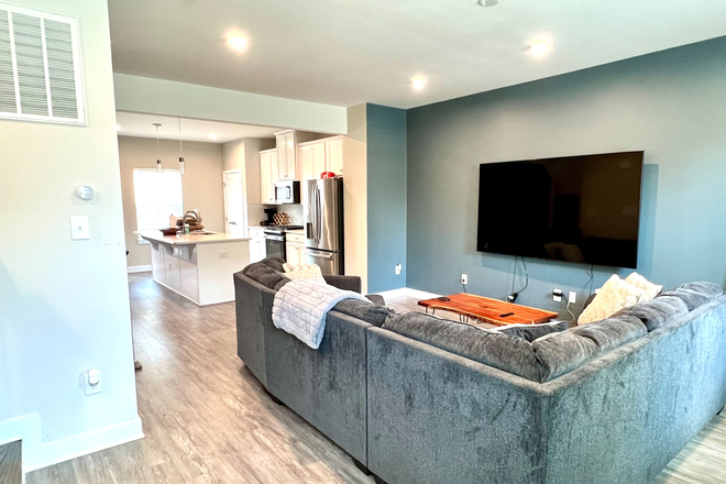 Second floor living room/kitchen view - New Utilities Included Townhouse with EV Charging, 5 Mins from Campus & Downtown
