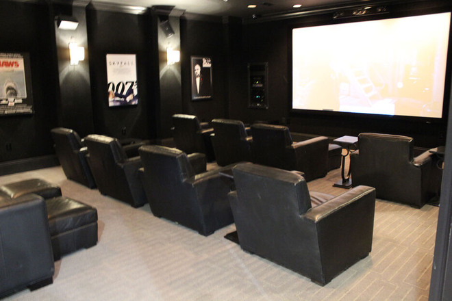 Inside Theater Room - HEAVILY DISCOUNTED SUBLEASE AVAILABLE • Flats at 4200 • Close to campus Apartments