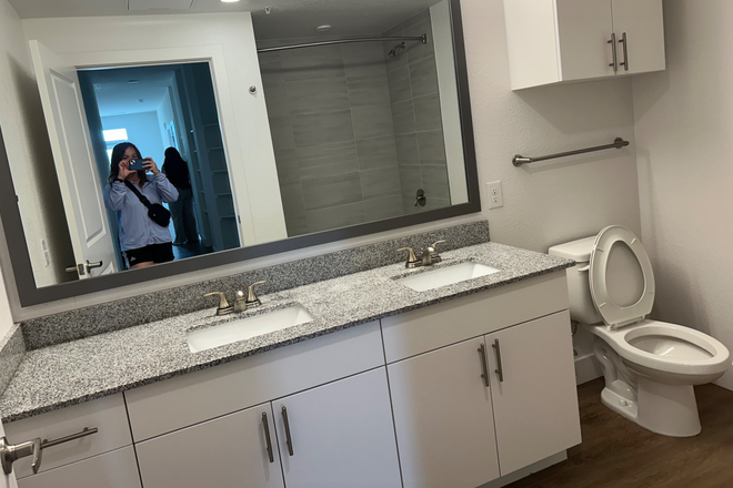 Shared bathroom (very spacious, shower is to right of toilet) - The Hayes Apartments
