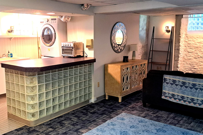Living area - 780 Sq Ft Bright English Basement – All Utilities Included – Walk to UC!  Close to Xavier! Apartments
