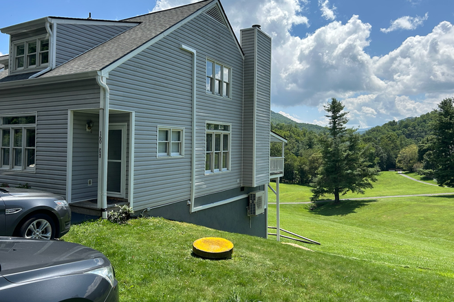 Side View - parking right in front of unit!!! - Willow Valley Townhome on Golf Course