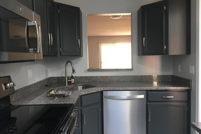 Kitchen breakfast bar - Available Jun 2026 - 3bd 2ba Courtyard condo, up to 4 unrelated, walking distance to Storrs downtown