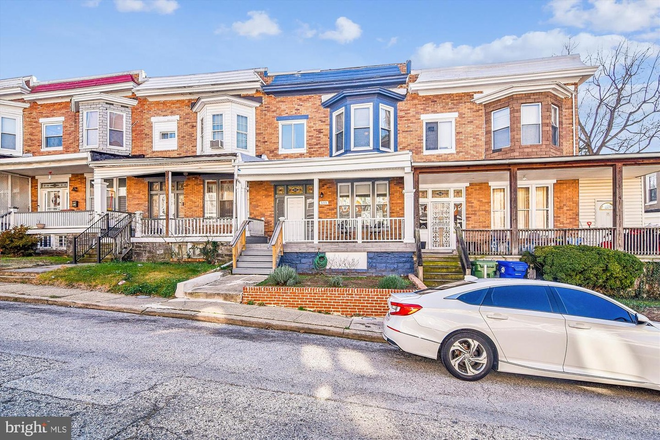 Outside street View - 2,400+ square feet of living space with four bedrooms and two bathrooms, close to JHU campus Townhome