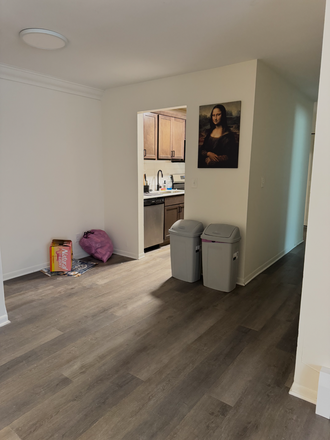 Dining room leading into kitchen and hallway - Berrytree apartments
