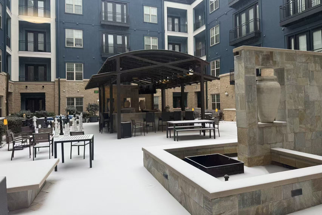 a view of snow from balcony - Trinity  Commons Apartments