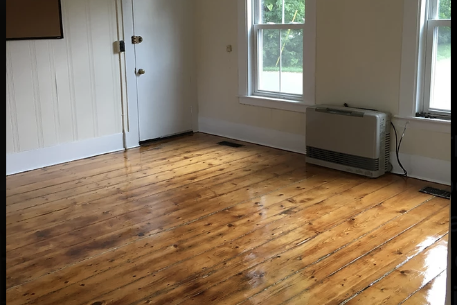 Livingroom - One Bedroom Apartment Next Door to VLS - Utilities Included