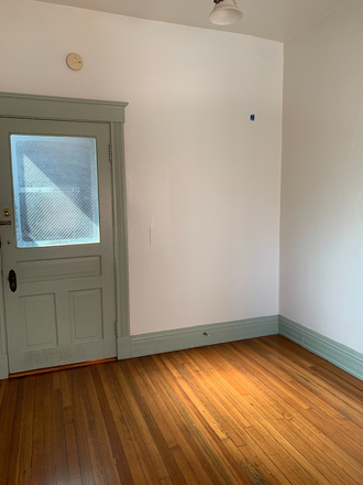 Front door - 220 W McMillan Student Housing building  - Spacious 2 bedroom apartment just 200 feet from UC campus