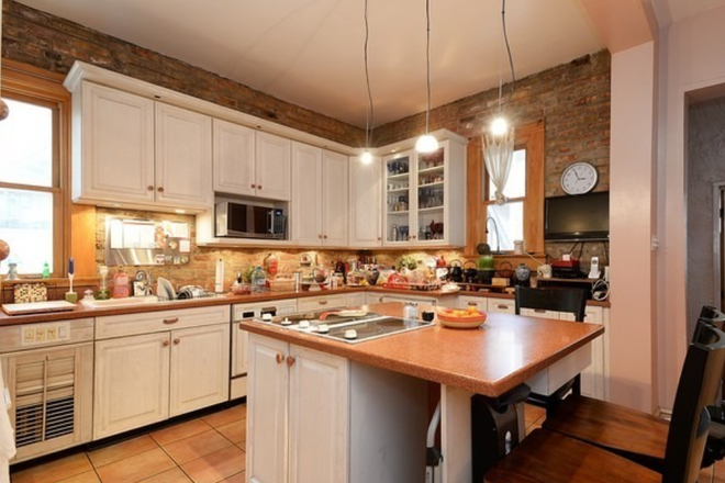 Kitchen - Unique brick two-flat with private side yard and spacious rooms one block from the lake Duplex