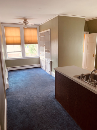 Dining room/study area - Charming 1 bedroom next to athletic complex, parking included, quiet/beautiful street Apartments