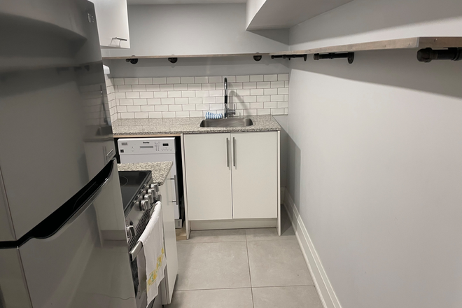 Kitchen and appliances - Modern / Semi-furnished and laundry included  1 Bedroom Apartment