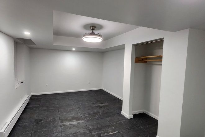 BR/Living Area, including ceiling fan - Newly-renovated Basement studio with full-sized windows in SFH; 1 mile to CUA House