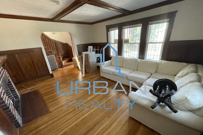 Living Room - **NOW RENTING JUNIOR YEAR 2026-2027**  LARGE 6 BED 3 BATH HOUSE - PORCH AND YARD - PARKING INCL -