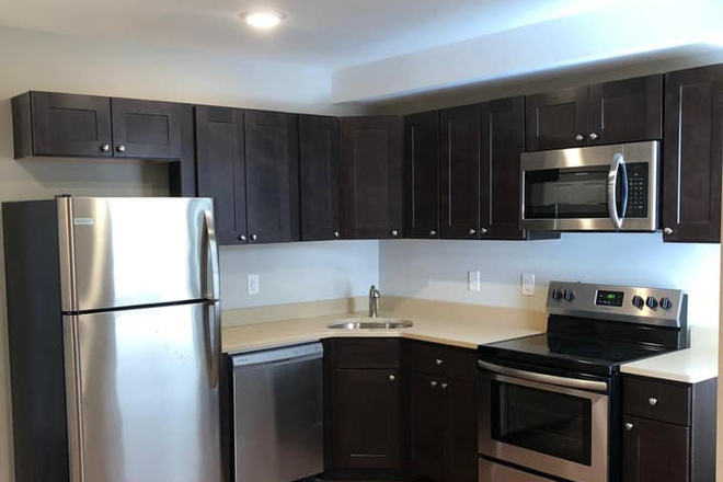 Kitchen - 2018 N. Carlisle St. Apartments