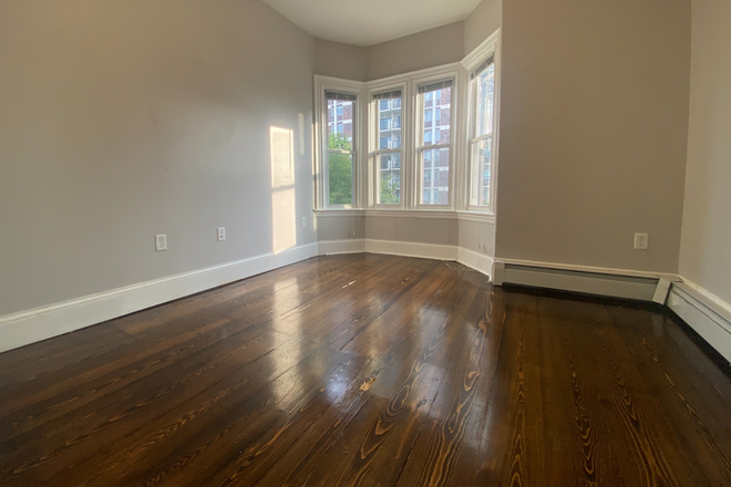 Bedroom #1 - Gorgeously renovated 3-bed 1 bath located on Tremont Street in Mission Hill! Apartments