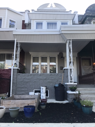 front of house from street - Recently remodeled West Philly rowhouse on a friendly block!