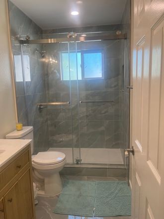 Full bathroom - Master bedroom with separate entrance and self accessible mini-split air/heat system House