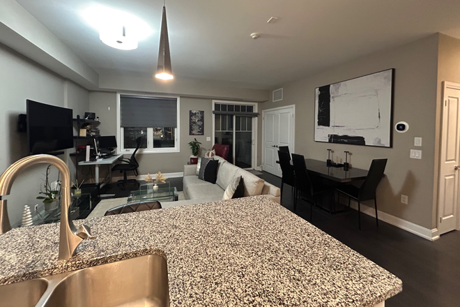 Living room - Spacious 2 bedroom, 2 bathroom almost 1000sq ft unit in a convenient location Townhome