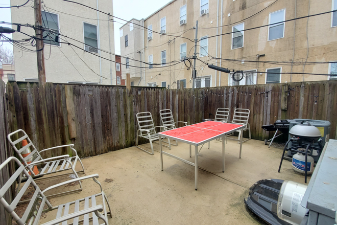 fenced backyard - Furnished 4 bedroom 2 bathroom apartment.