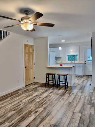 Living room with open floor plan. - Ready NOW! Newer 2-Bedroom House. Washer/Dryer Included. 7-minute drive to UTK.