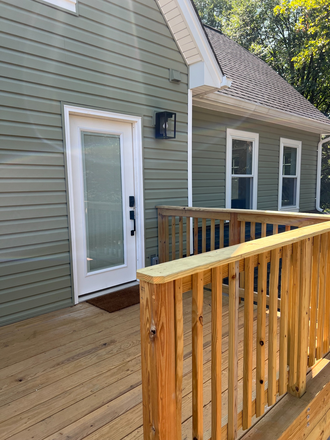 Exterior deck leading ton second floor - Two x 2 two-bedroom, two bathroom completely renovated apartments in Roland park