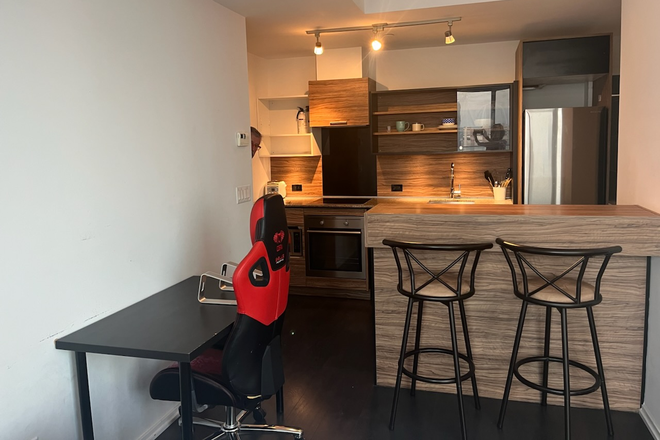 Living room - Furnished Bachelor Unit on 29th Floor Steps from UofT and TTC Ready to Move-In Condo