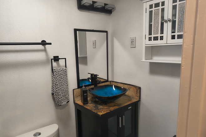 bathroom with a siting shower - Basement-suite, centennial-greenwood village Townhome