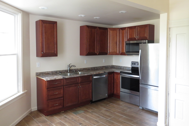 Kitchen - Three bedroom located 5 minute walk to campus. Property remodeled five years ago. Two baths Triplex