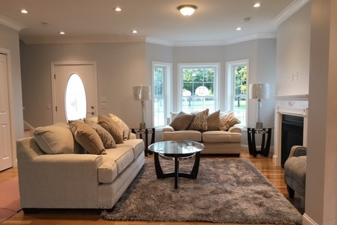 Living room - Four levels of living and 5 minute walk to campus! Townhome