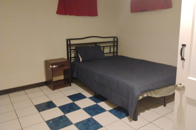 Bedroom from doorway - Basement Apartment in Hollywood Neighborhood