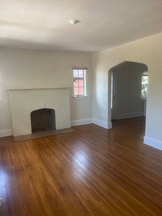 Once through the front door, your unit door walks into this family room. - Hyde Park 2 family, upper unit available, 4 bedroom/2 bath Duplex