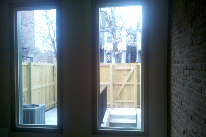 View of deck and fence from rear window - 2br - 1092ft2 - 2BD/1.5BTH, UNIQUELY BEAUTIFUL Home for Rent in Ridgely's Delight!!!