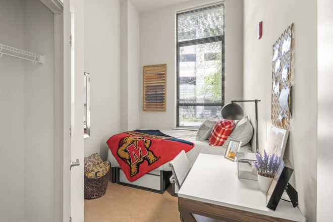 Bedroom with attached bathroom and window - Terrapin Row Unit with Bathroom