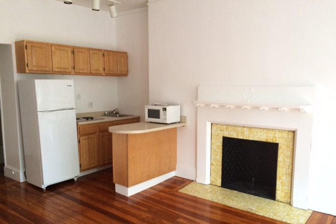 LIVING ROOM - OPEN CONCEPT ONE BEDROOM APT WITH HARDWOOD FLOORS AT 1077 BEACON STREET IN BROOKLINE AVAIL. 9/1/2026