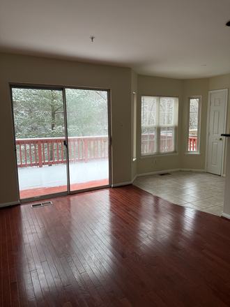 Small Dining Area and patio - Beautiful Townhome in Greenbelt