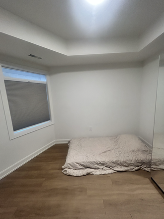 Bedroom with mattress - 1 bedroom with laundry and mattress in Koreatown/Annex