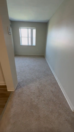 Living Room (ADVERTISED 3rd bedroom) - Harbor Point Apartments [Close to campus, markets, JFK]