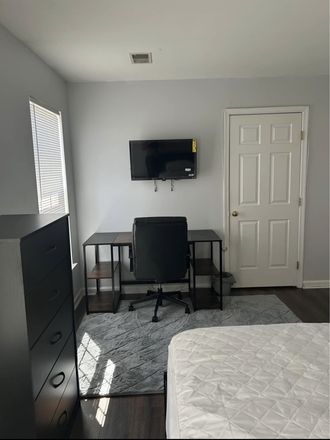 Desk and TV in bedroom - Room for Rent in Townhouse with private bathroom and parking